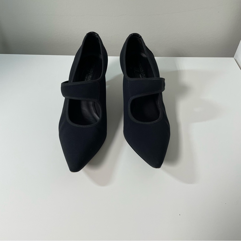 Women’s Donald J Pliner black heels with croc heel leather back.